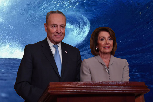 Chuck Schumer and Nancy Pelosi at the podium with a blue wave backdrop.